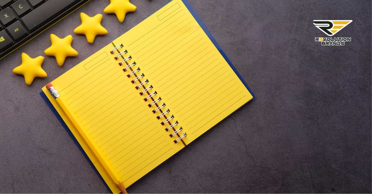 This image features a bright yellow notebook with lined pages and a matching pencil, complemented by five yellow star shapes, symbolizing excellence or ratings. Positioned on a dark textured background, the scene conveys organization, planning, and quality. This visual metaphor suggests themes of preparation, striving for success, and the pursuit of top-notch customer experiences, aligning well with the franchising and business innovation themes Revolution Brands champions.