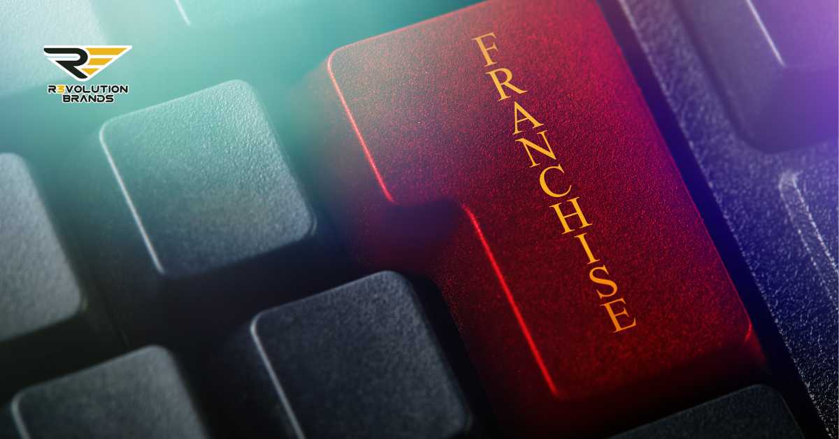 An up-close image of a computer keyboard with a special focus on one of the keys. This key stands out with a vibrant red hue and is labeled 'FRANCHISE' in bold gold letters, set against the cooler blues and grays of the surrounding keys. The image cleverly symbolizes the importance of franchising as a key component in the business strategy spectrum, highlighted by the R3volution Brands logo at the top, which suggests a focus on innovative business solutions.