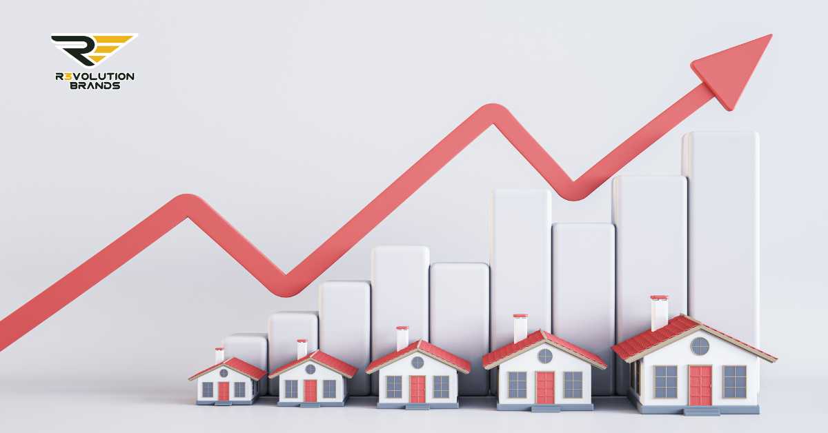 The image depicts a 3D representation of a growth chart, showing a red upward trend arrow among a series of white bar graphs, with models of small houses at the base of the graphs. Each house is detailed, with red roofs and white walls, indicating a steady increase in the residential or home-based sector. The R3volution Brands logo is prominently displayed at the top left, suggesting the brand's involvement in home-based franchises or its growth in a residential market context. The overall design conveys a message of positive growth and development in home-based business opportunities.